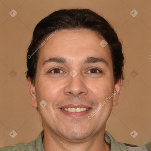 Joyful white adult male with short  brown hair and brown eyes