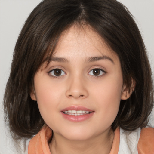 Joyful white child female with medium  brown hair and brown eyes