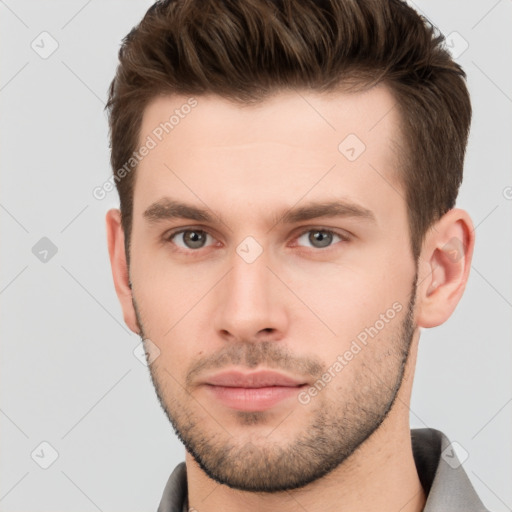 Neutral white young-adult male with short  brown hair and brown eyes