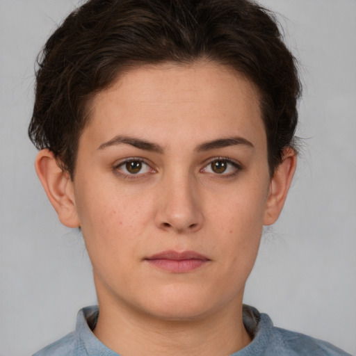 Neutral white young-adult female with short  brown hair and brown eyes