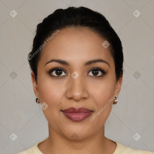 Joyful latino young-adult female with short  black hair and brown eyes