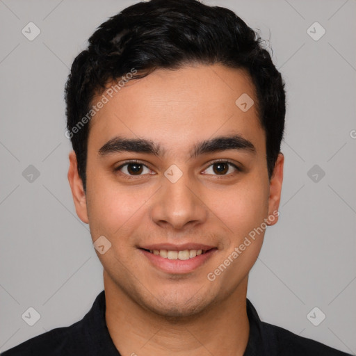 Joyful latino young-adult male with short  black hair and brown eyes