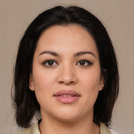 Joyful asian young-adult female with medium  brown hair and brown eyes