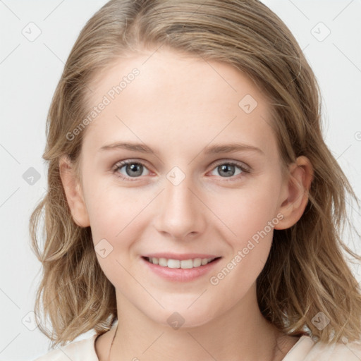 Joyful white young-adult female with medium  brown hair and blue eyes