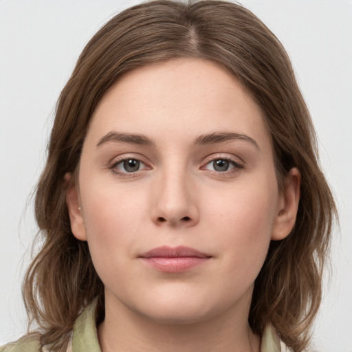 Neutral white young-adult female with medium  brown hair and grey eyes