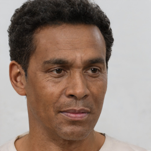 Neutral black adult male with short  brown hair and brown eyes