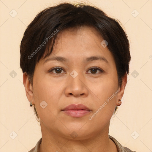 Neutral asian adult female with short  brown hair and brown eyes