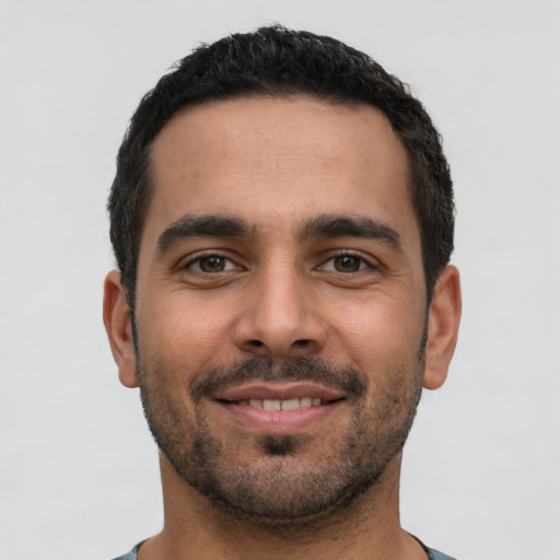 Neutral latino young-adult male with short  black hair and brown eyes