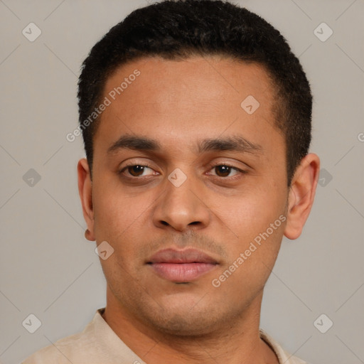 Neutral latino young-adult male with short  black hair and brown eyes