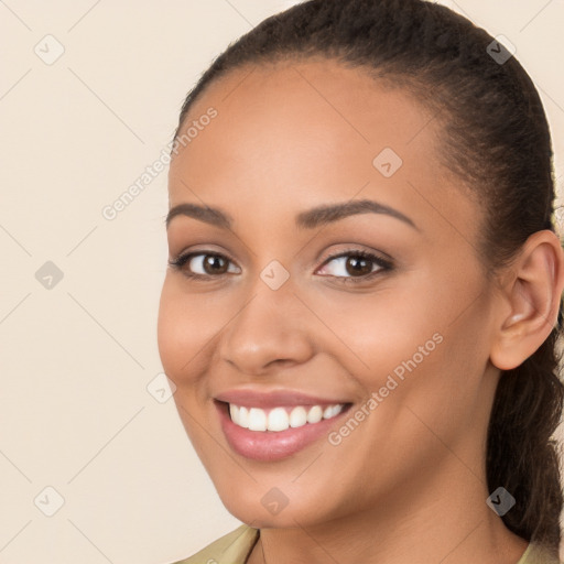 Joyful white young-adult female with long  brown hair and brown eyes