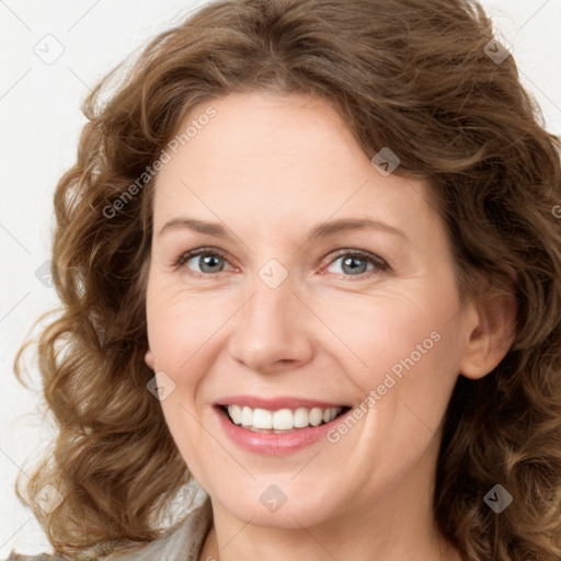 Joyful white young-adult female with medium  brown hair and green eyes