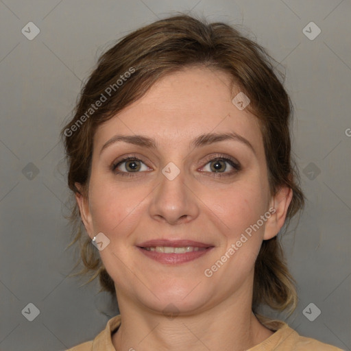 Joyful white adult female with medium  brown hair and grey eyes