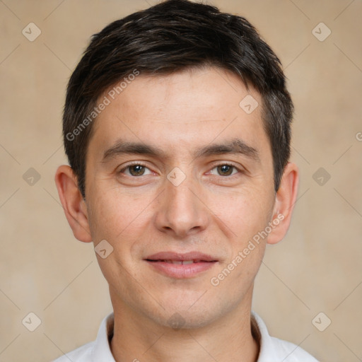 Joyful white young-adult male with short  brown hair and brown eyes