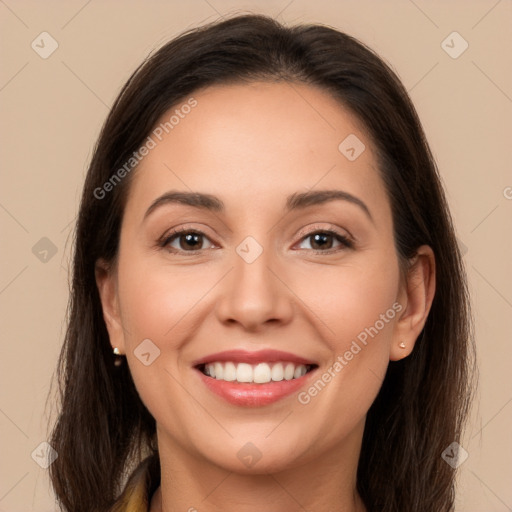 Joyful white young-adult female with long  brown hair and brown eyes