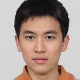 Neutral asian young-adult male with short  brown hair and brown eyes