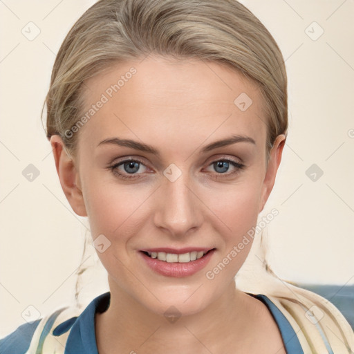 Joyful white young-adult female with medium  brown hair and blue eyes