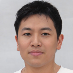 Neutral asian young-adult male with short  brown hair and brown eyes