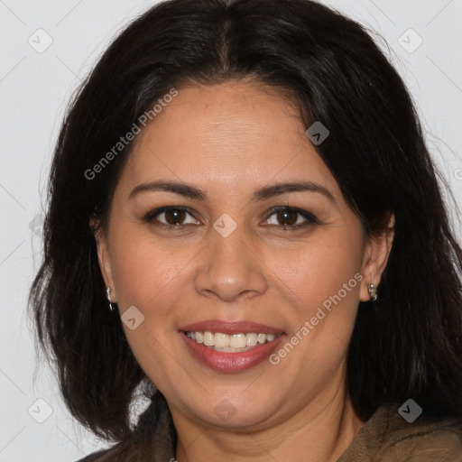 Joyful white adult female with long  brown hair and brown eyes