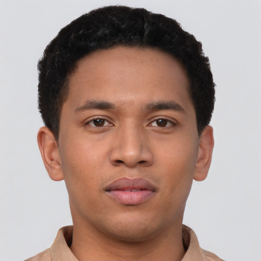 Neutral latino young-adult male with short  brown hair and brown eyes