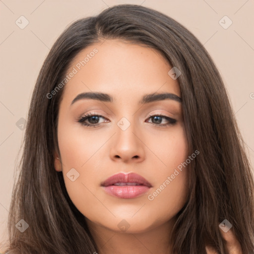 Neutral white young-adult female with long  brown hair and brown eyes