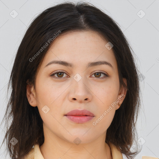 Joyful white young-adult female with long  brown hair and brown eyes