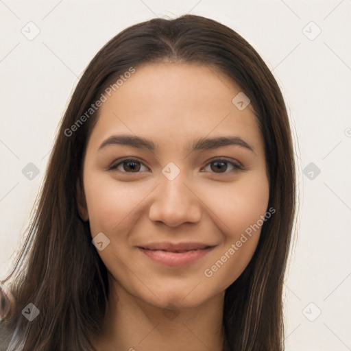 Joyful latino young-adult female with long  brown hair and brown eyes