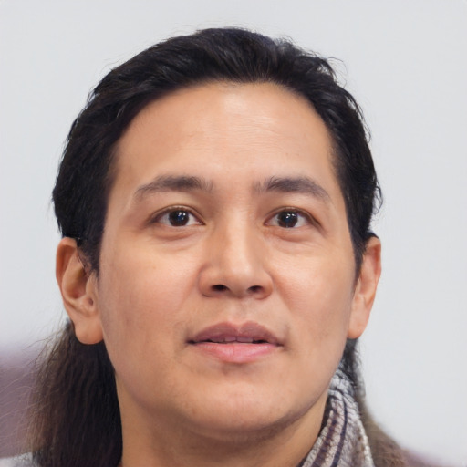 Neutral asian adult male with short  brown hair and brown eyes