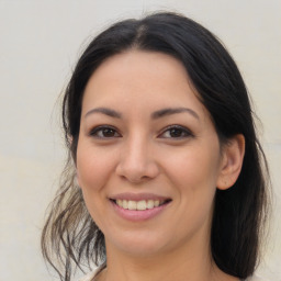 Joyful asian young-adult female with medium  brown hair and brown eyes