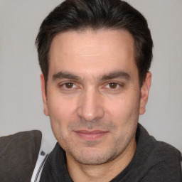 Neutral white adult male with short  brown hair and brown eyes