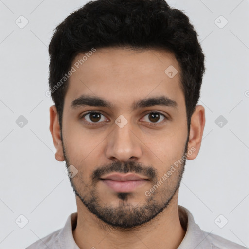 Neutral latino young-adult male with short  black hair and brown eyes