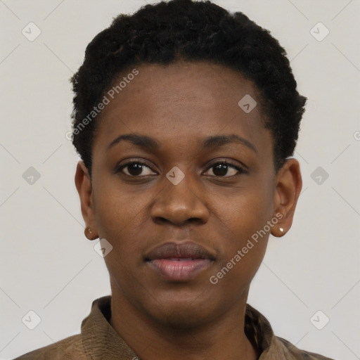 Joyful black young-adult female with short  black hair and brown eyes