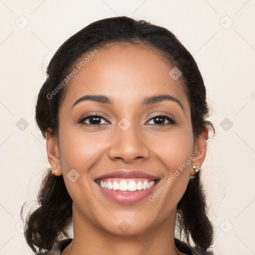 Joyful latino young-adult female with long  brown hair and brown eyes