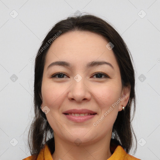 Joyful white young-adult female with medium  brown hair and brown eyes