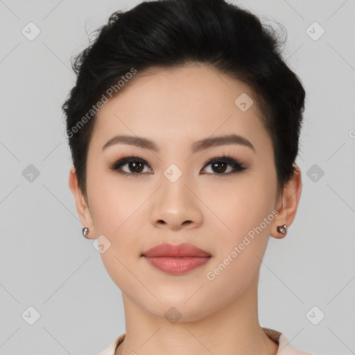 Joyful asian young-adult female with short  black hair and brown eyes