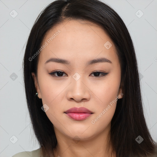 Joyful asian young-adult female with long  brown hair and brown eyes