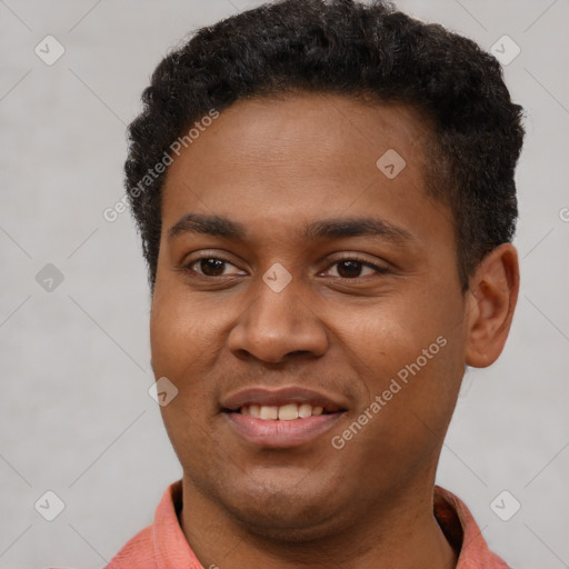 Joyful black young-adult male with short  brown hair and brown eyes