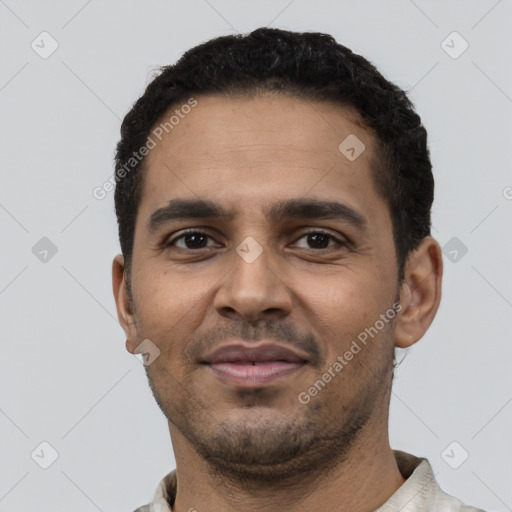 Neutral latino young-adult male with short  black hair and brown eyes