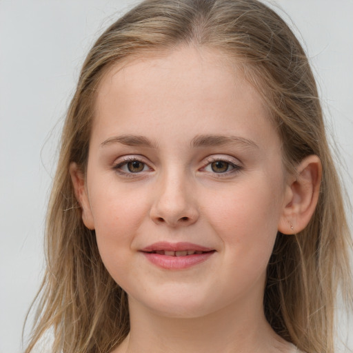 Joyful white child female with long  brown hair and grey eyes