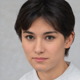 Neutral white young-adult female with medium  brown hair and brown eyes