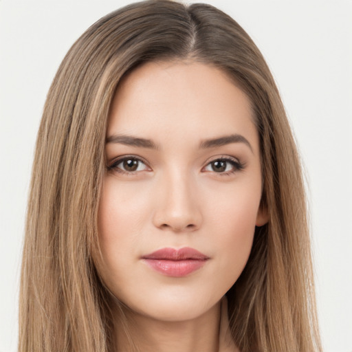 Neutral white young-adult female with long  brown hair and brown eyes