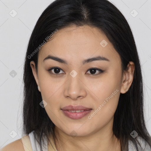 Joyful asian young-adult female with long  brown hair and brown eyes