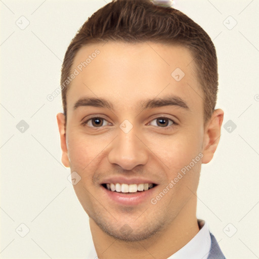 Joyful white young-adult male with short  brown hair and brown eyes