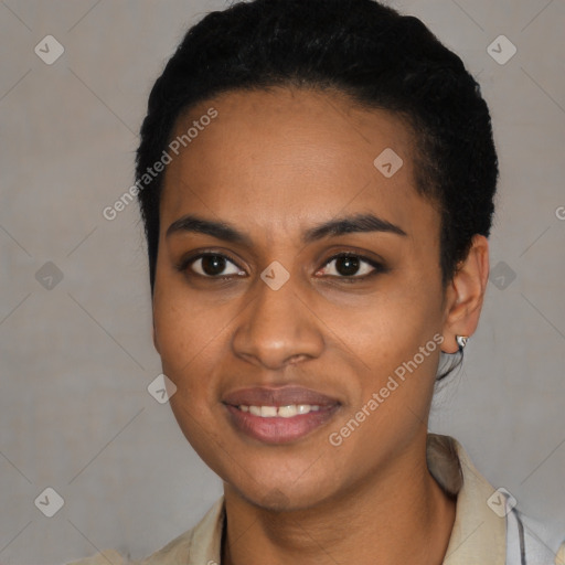 Joyful black young-adult female with short  black hair and brown eyes