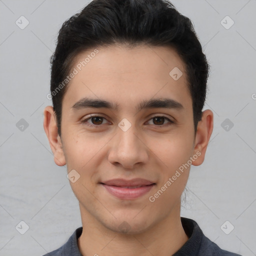 Joyful white young-adult male with short  black hair and brown eyes