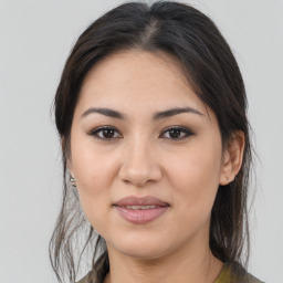 Joyful white young-adult female with medium  brown hair and brown eyes