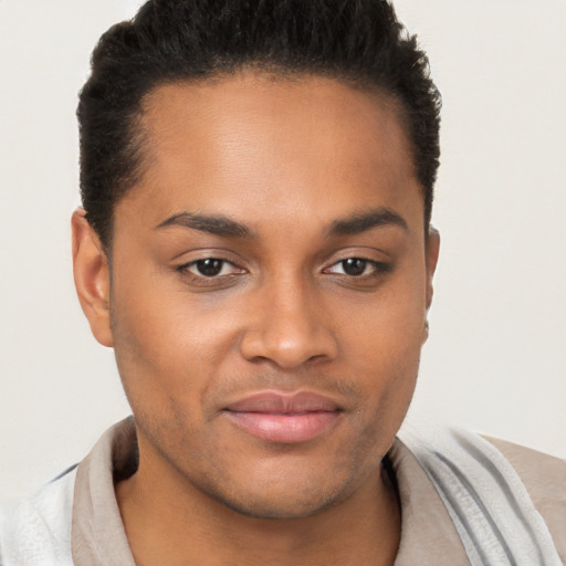 Joyful black young-adult male with short  brown hair and brown eyes