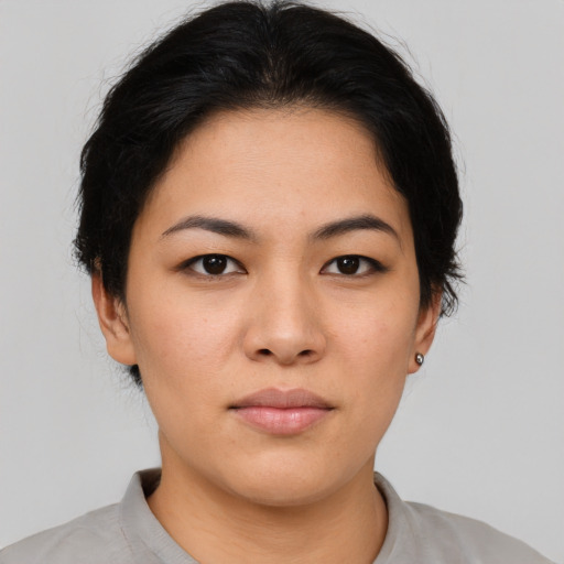 Neutral asian young-adult female with short  brown hair and brown eyes