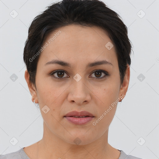 Joyful asian young-adult female with short  brown hair and brown eyes