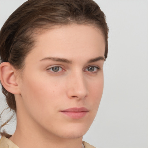 Neutral white young-adult female with short  brown hair and brown eyes