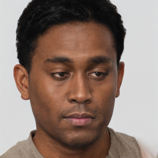 Neutral black young-adult male with short  brown hair and brown eyes